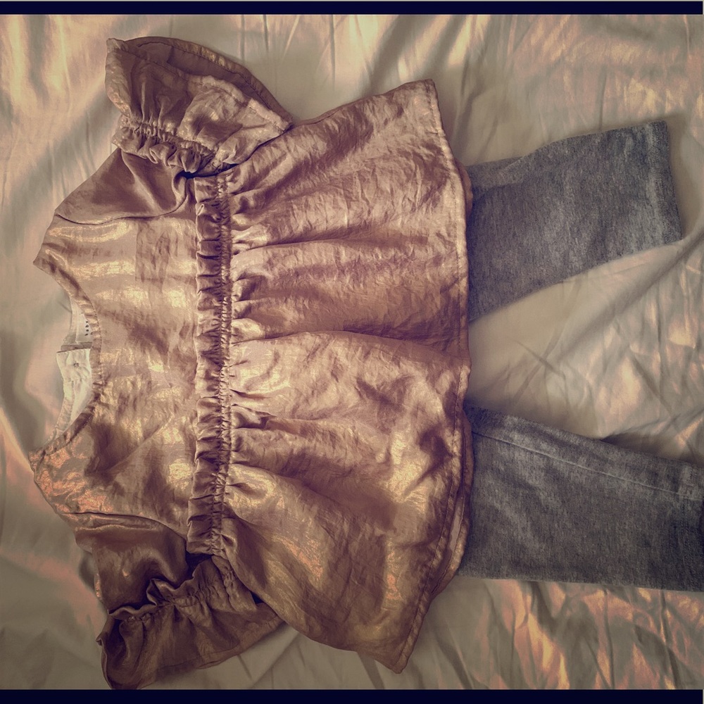 Metallic gold gap top with grey leggings.